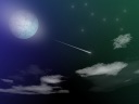 The shooting star which runs in the blue sky and emerald green and which twinkles